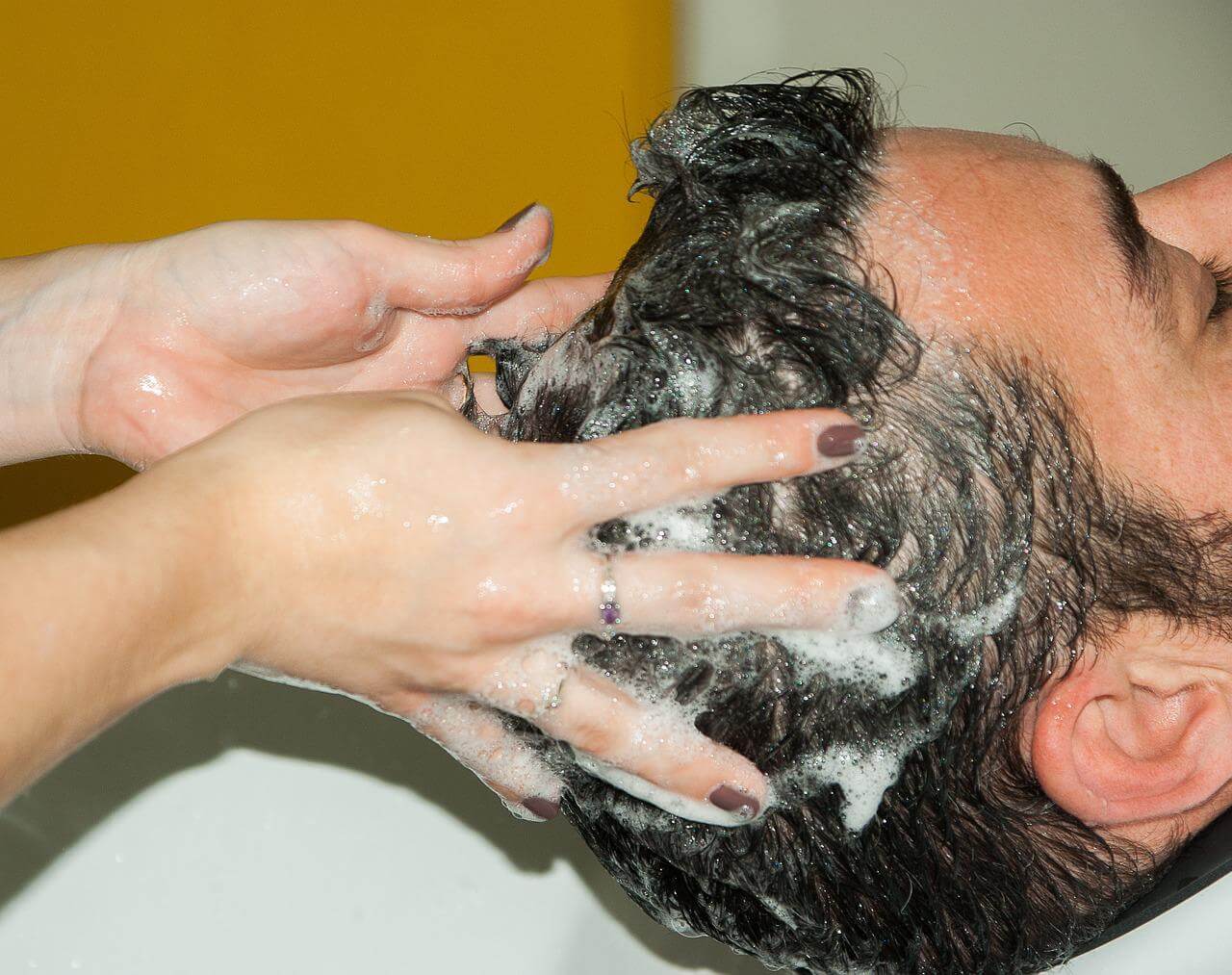 wash hair with shampoo